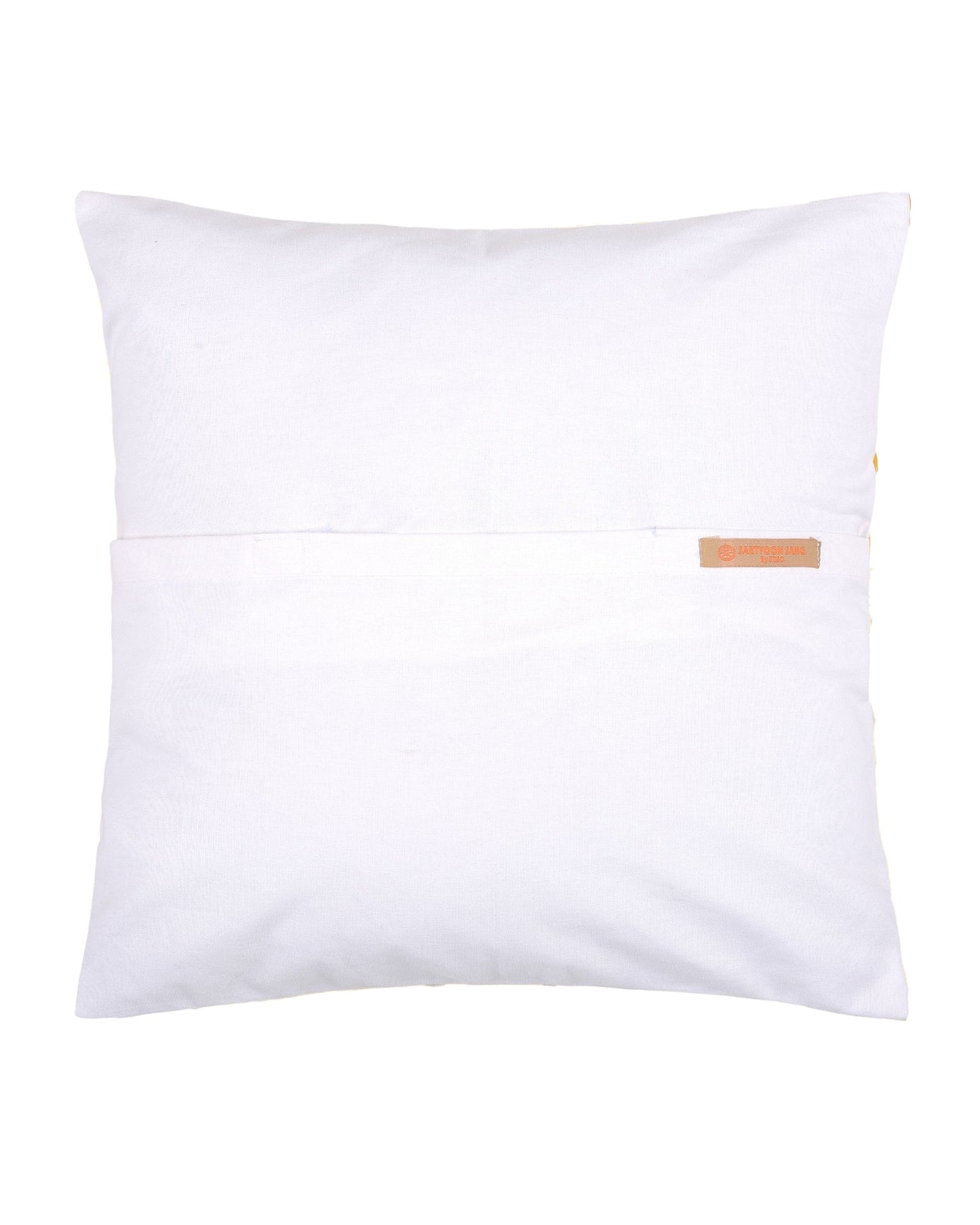 Yellow pillow with white pattern on a gray couch