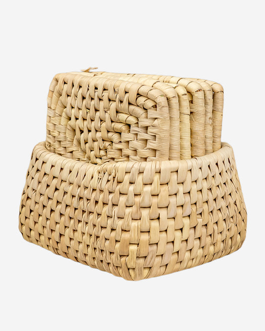 Set of woven beige coasters on a white background