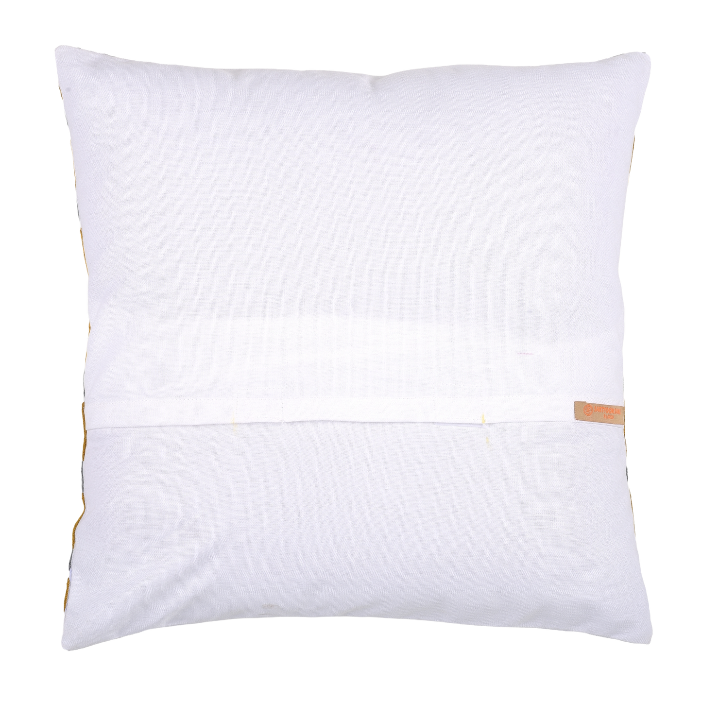 Decorative pillow with yellow and gray pattern on a gray sofa