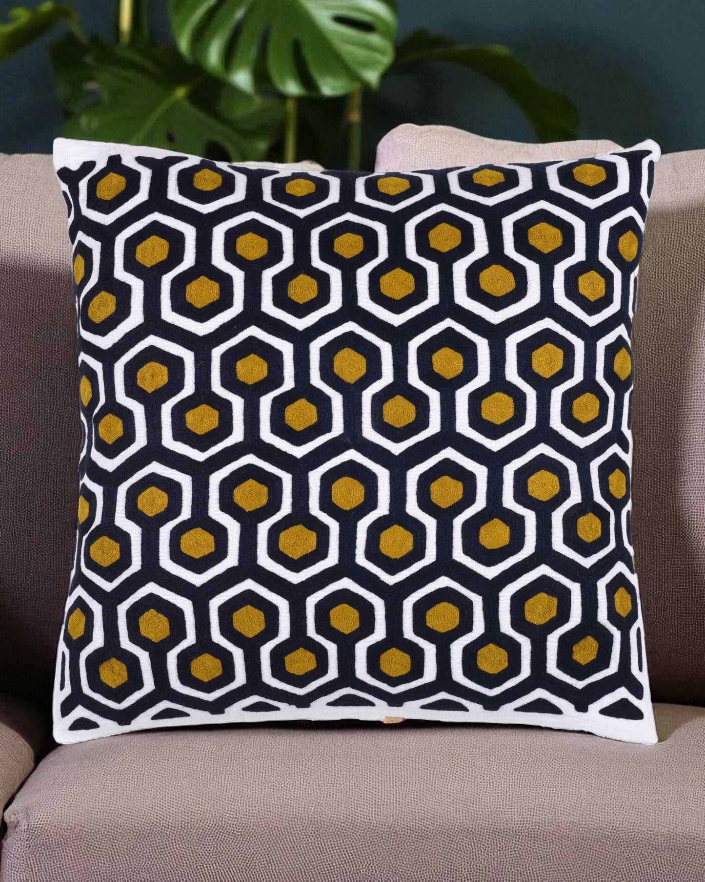 Decorative pillow with a geometric pattern on a couch