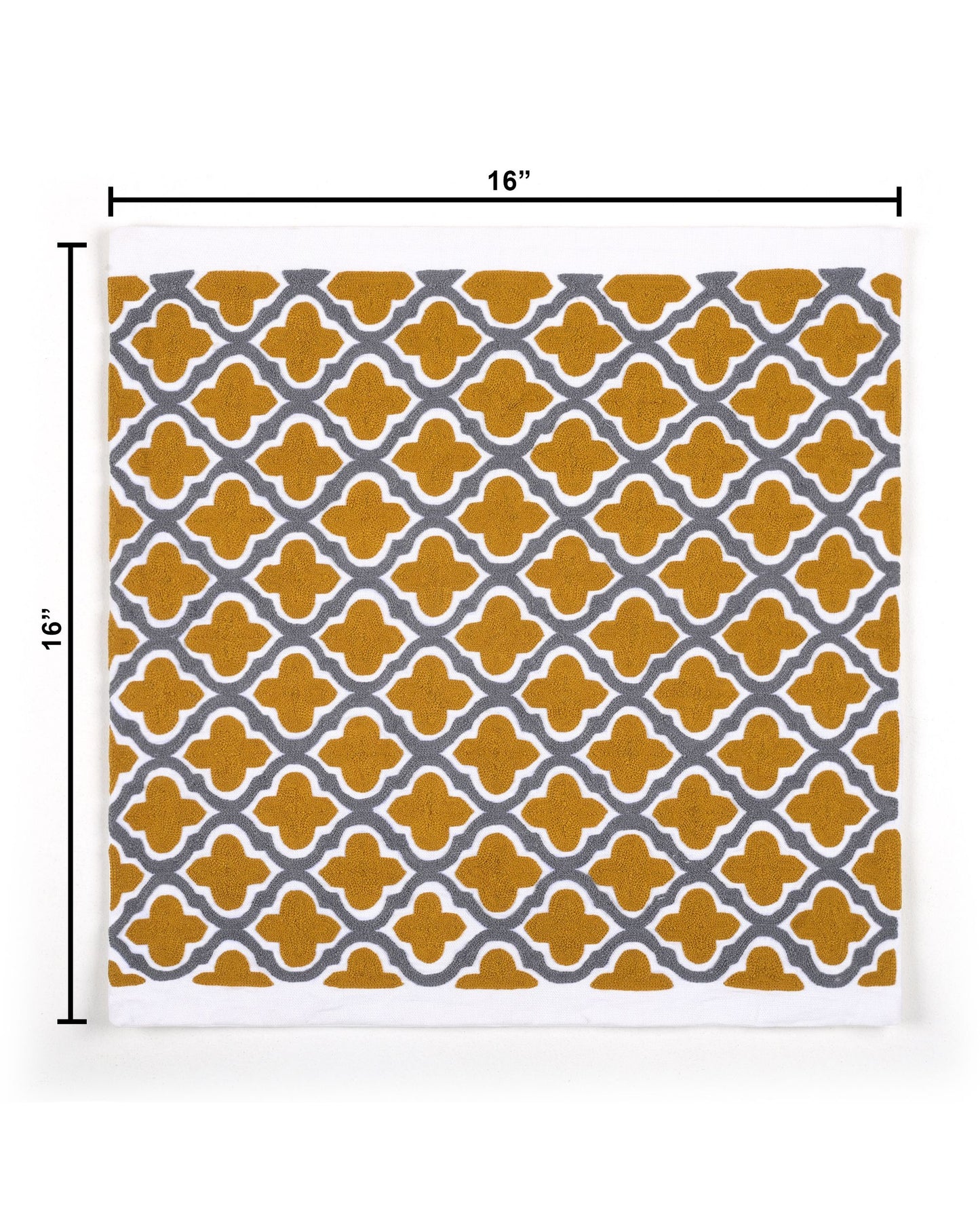 Decorative pillow with yellow and gray pattern on a gray sofa