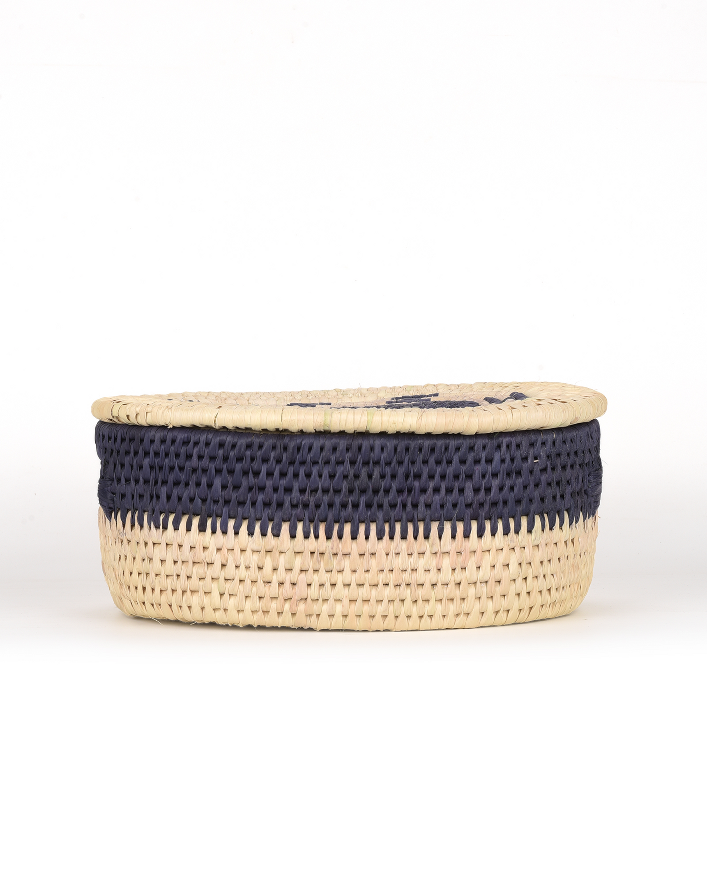 Woven basket with navy band on a white background