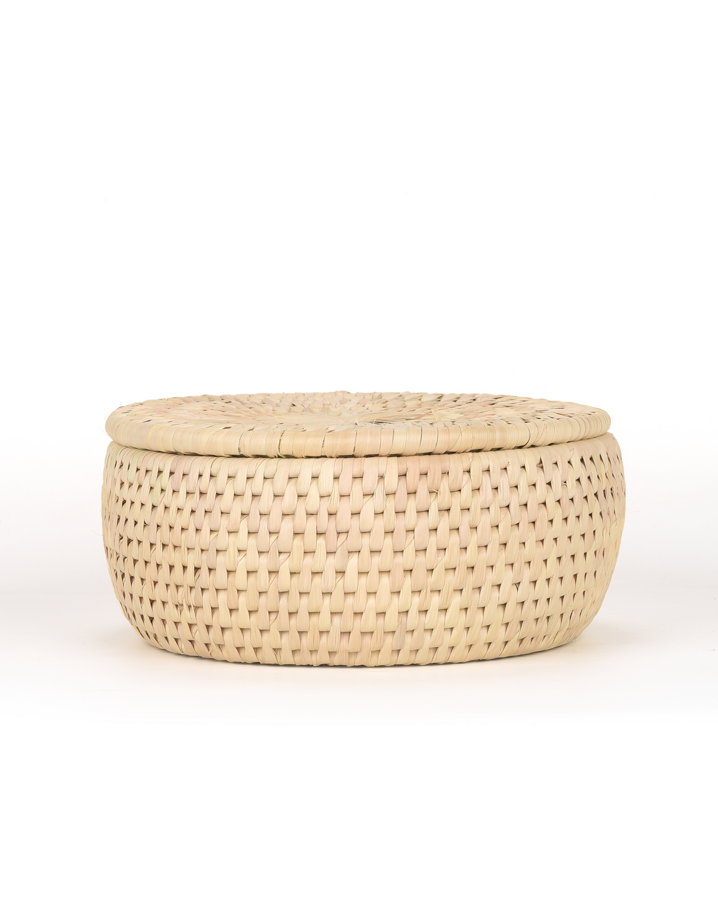 Woven basket with a lid on a white background