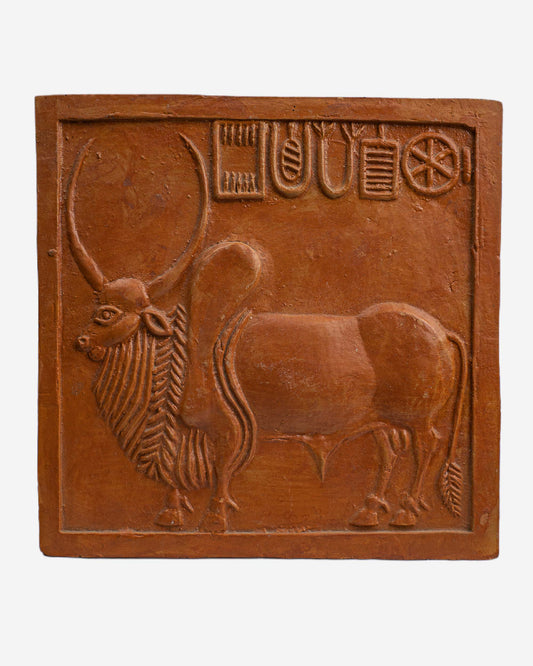 Terracotta tile with a bull design and ancient script, Clay Sculpture. Mohen-Jo-Daro Ancient Seal Clay