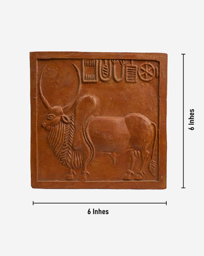 Terracotta tile with a bull design and ancient script, Clay Sculpture. Mohen-Jo-Daro Ancient Seal Clay
