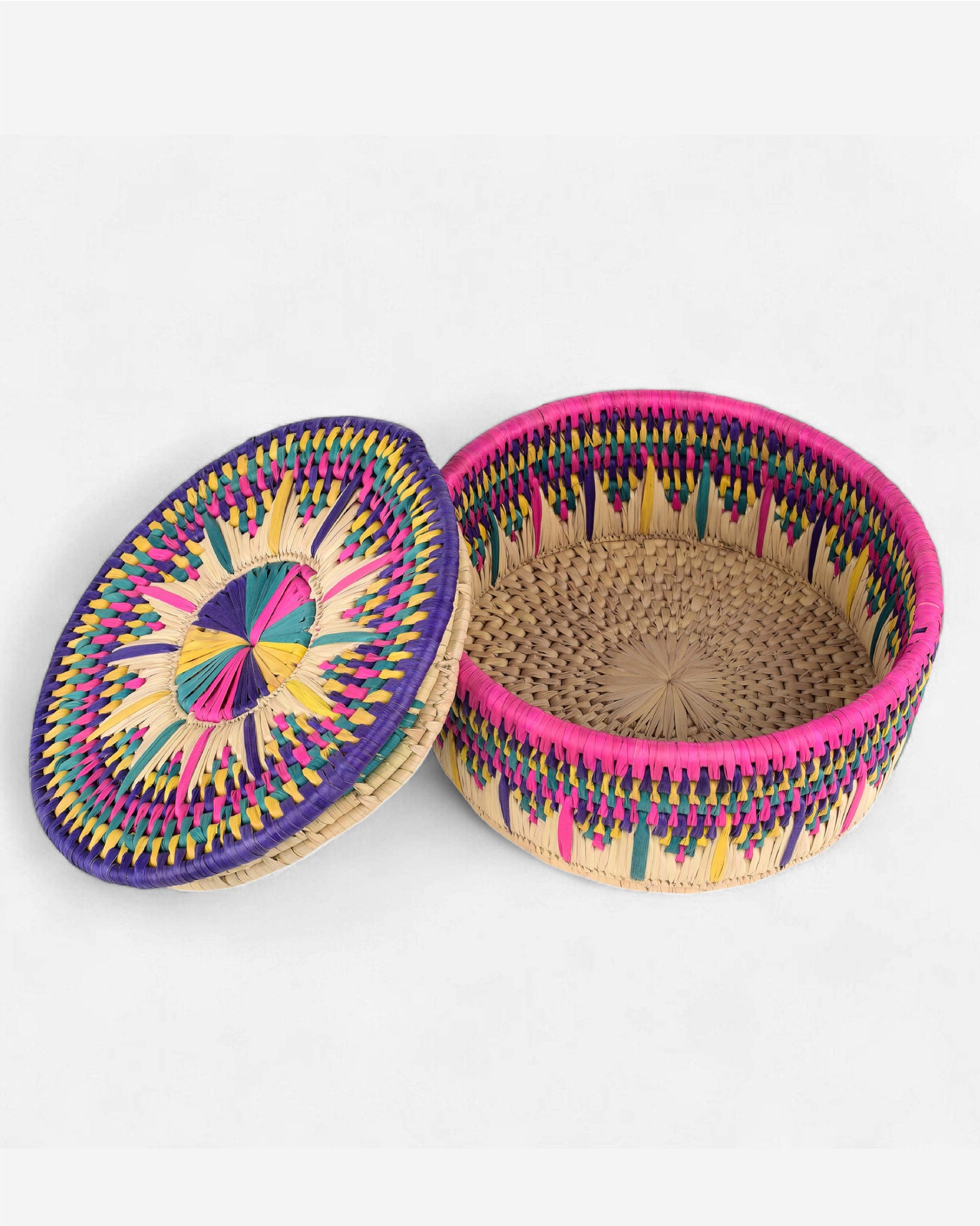 Colorful woven basket with a circular design on a white background
