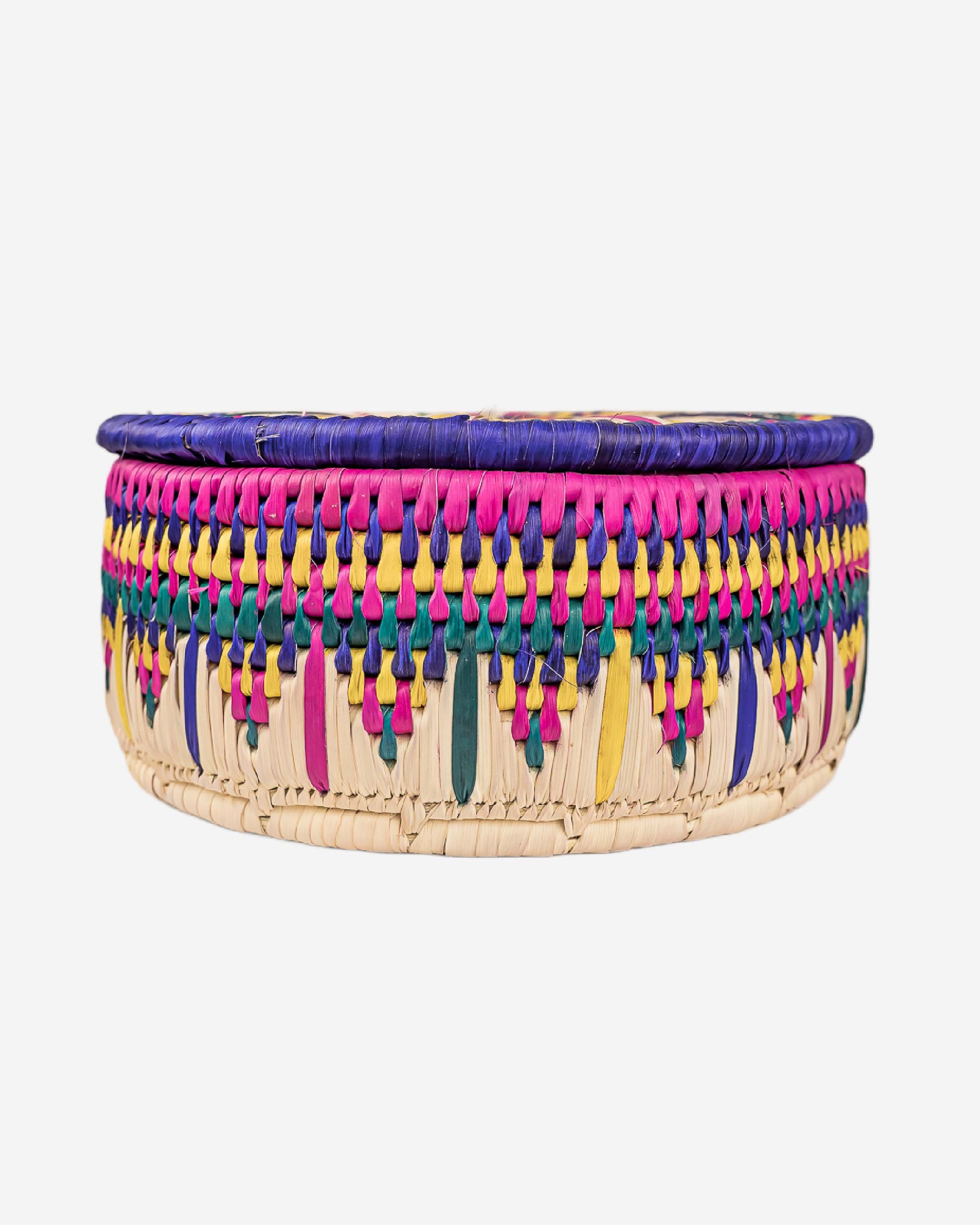 Colorful woven basket with a circular design on a white background