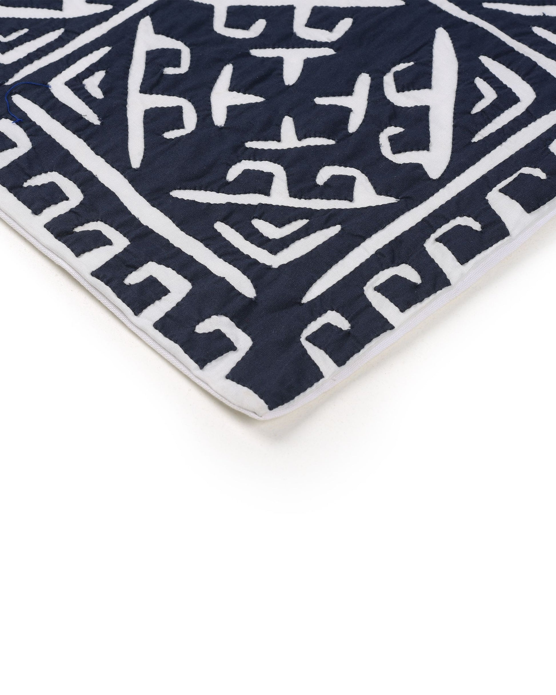 Navy blue fabric with white geometric pattern and measurements on a white background