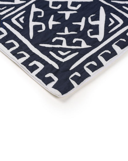 Navy blue fabric with white geometric pattern and measurements on a white background