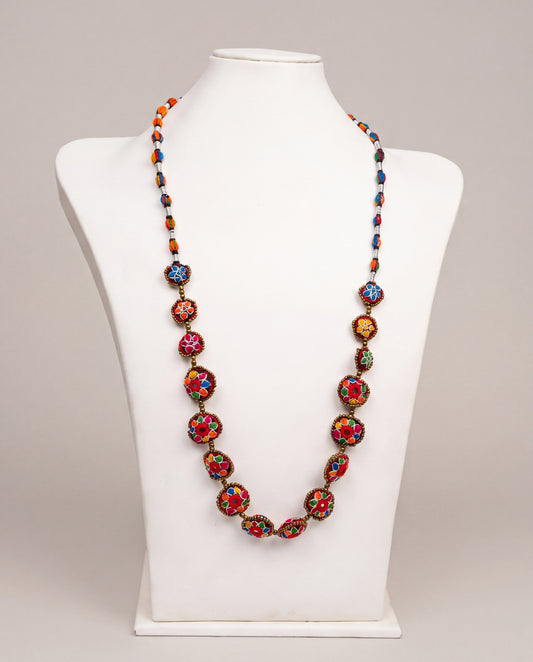 Handmade Balochi mirror flower necklace with colorful embroidered floral motifs, golden beads, silver thread, and traditional artisan craftsmanship from Pakistan.