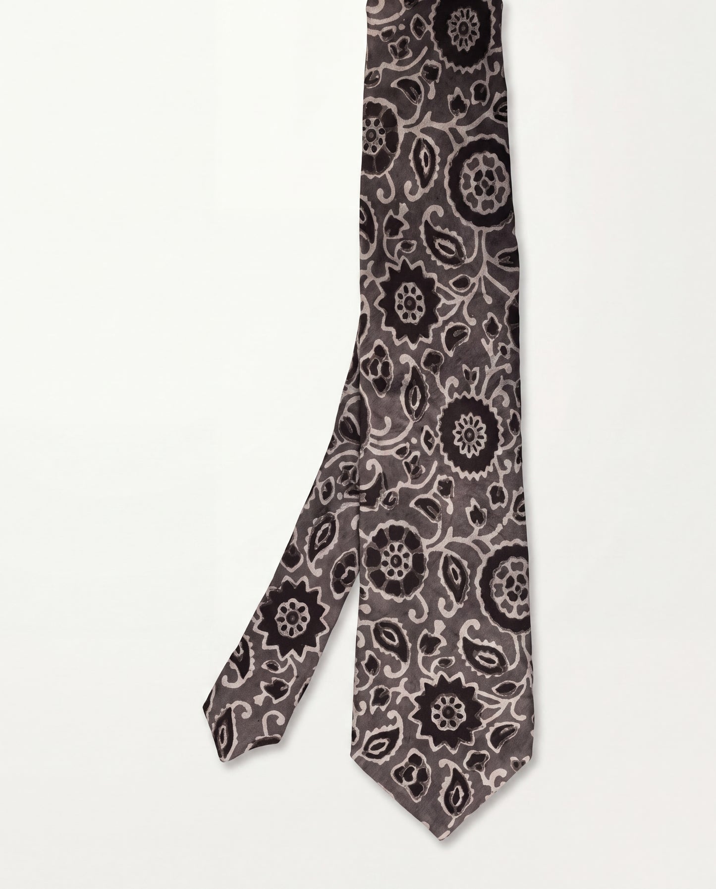 Silver Ash Natural Dye Silk Necktie handcrafted from premium silk with elegant hand block printed floral motifs in silver grey and black.