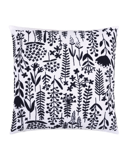 Cushion cover with black floral pattern on white background