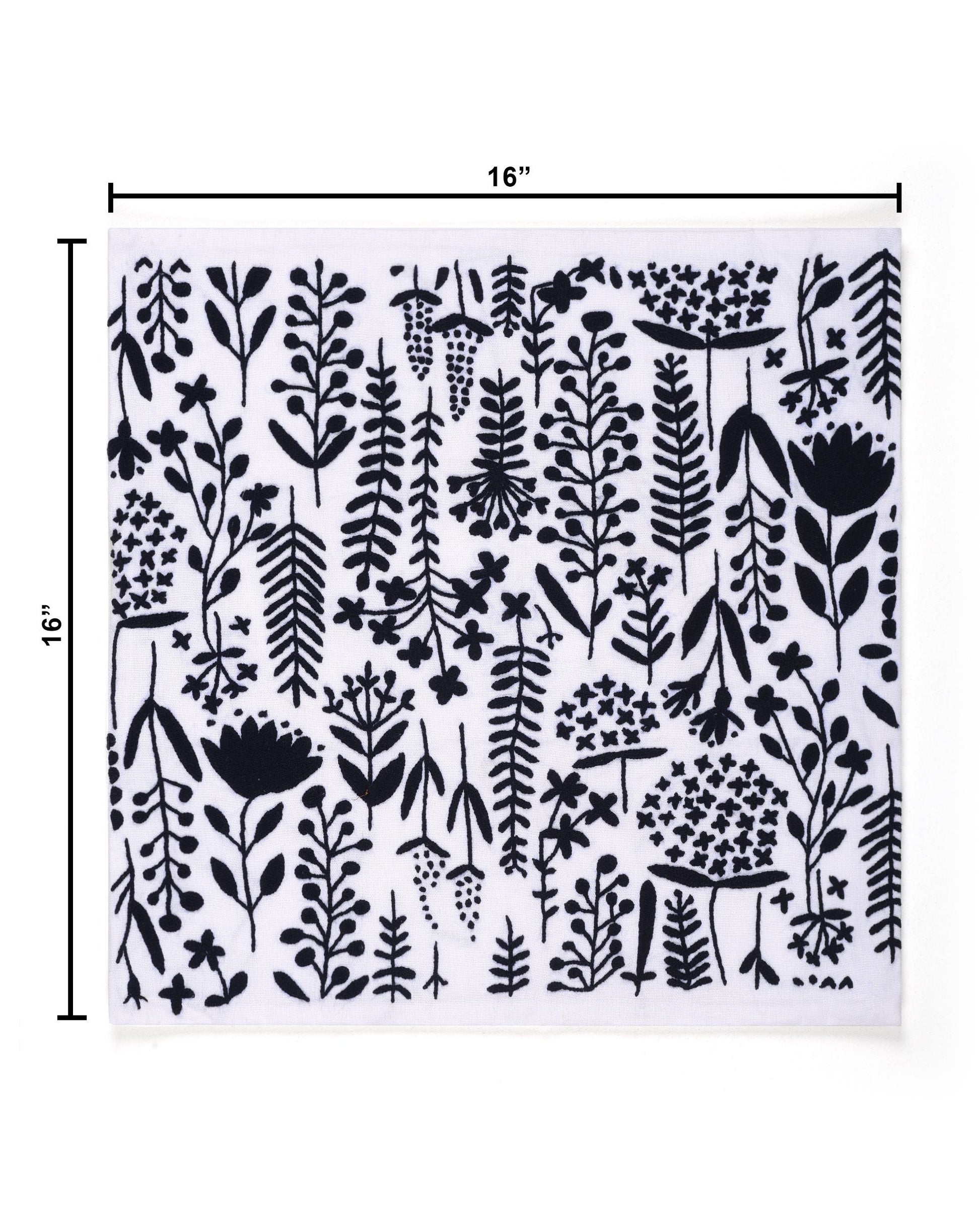 Black floral pattern on a white background cushion cover with dimensions indicated.