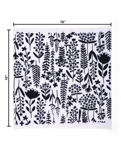 Black floral pattern on a white background cushion cover with dimensions indicated.