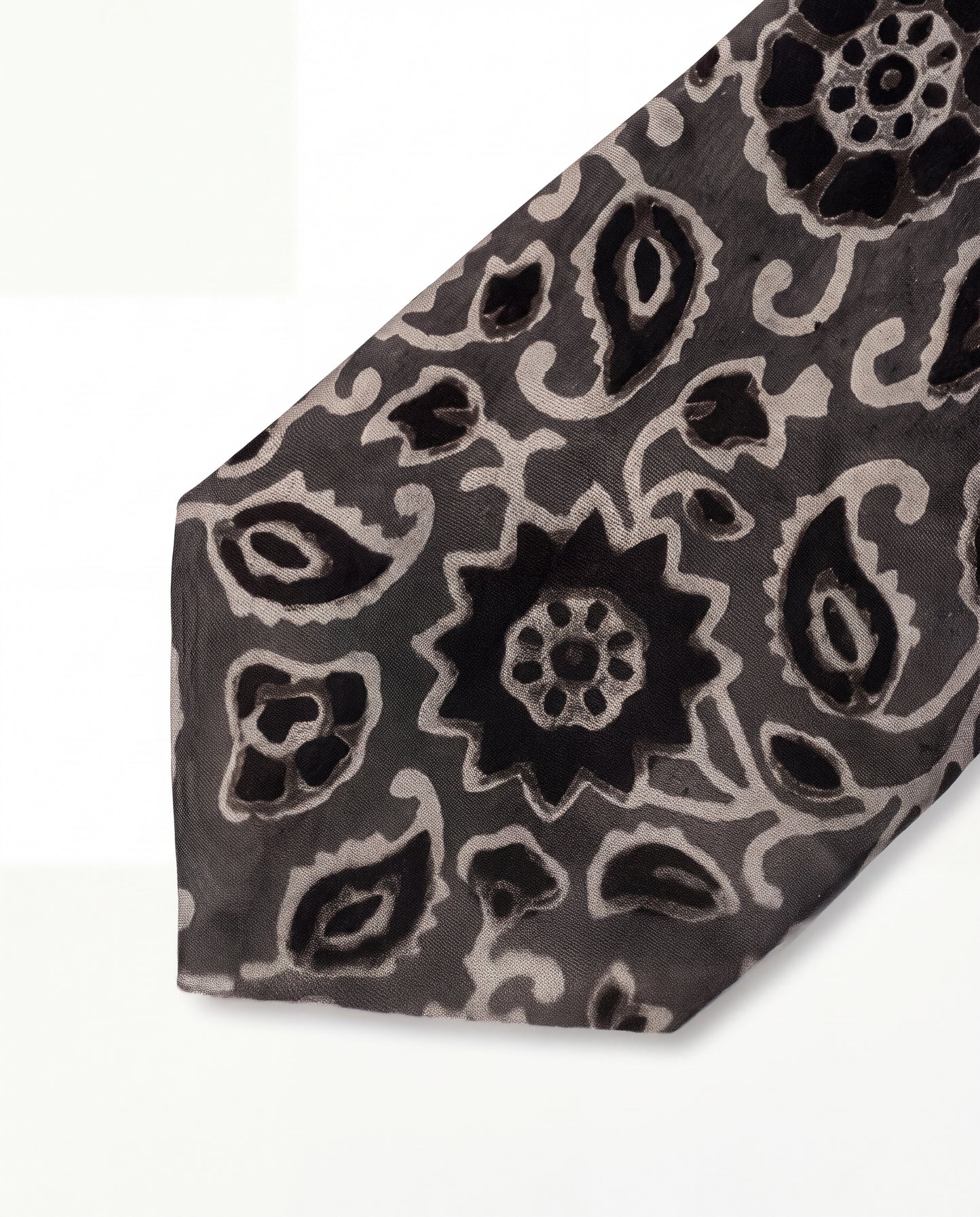 Silver Ash Natural Dye Silk Necktie handcrafted from premium silk with elegant hand block printed floral motifs in silver grey and black.