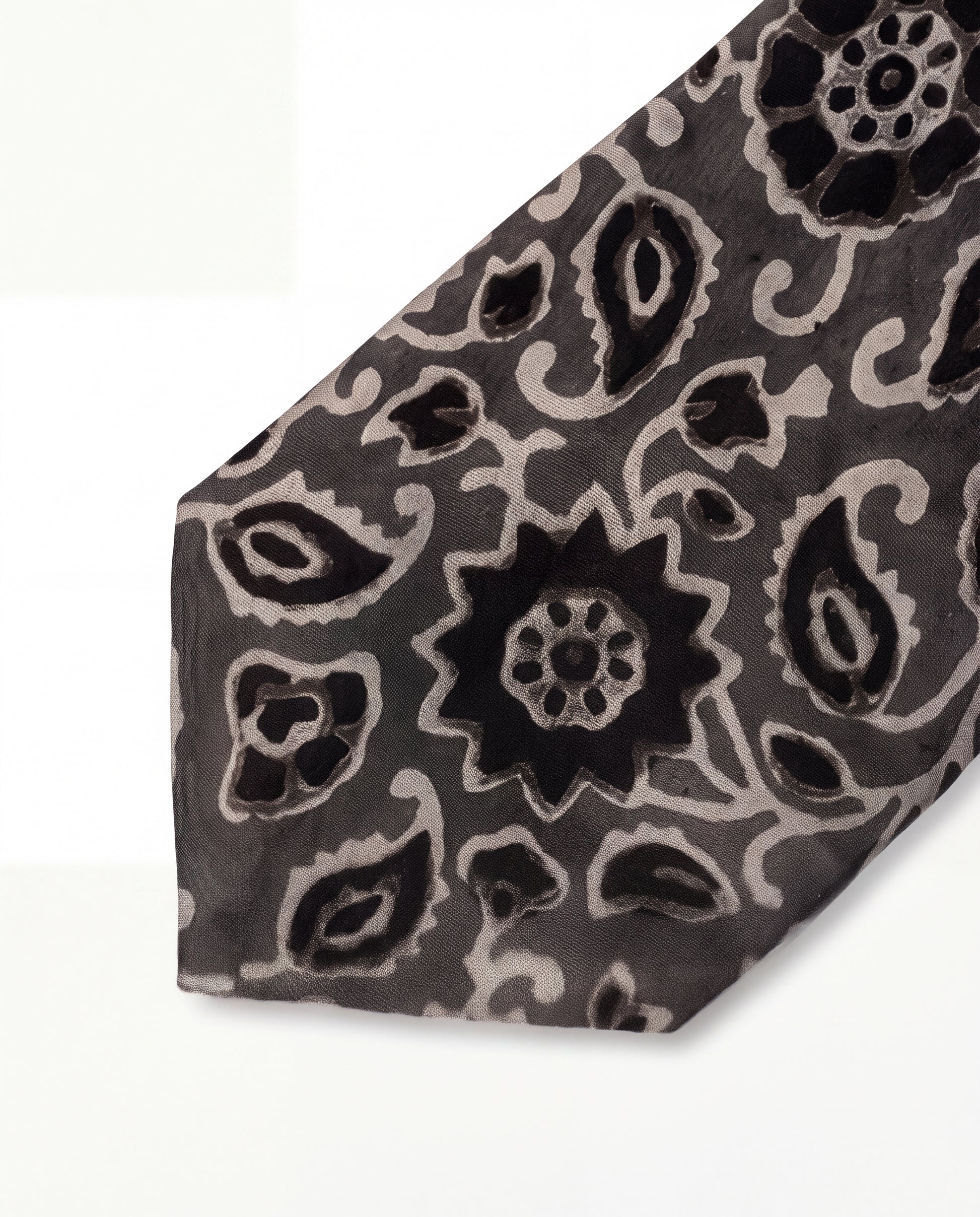 Silver Ash Natural Dye Silk Necktie handcrafted from premium silk with elegant hand block printed floral motifs in silver grey and black.
