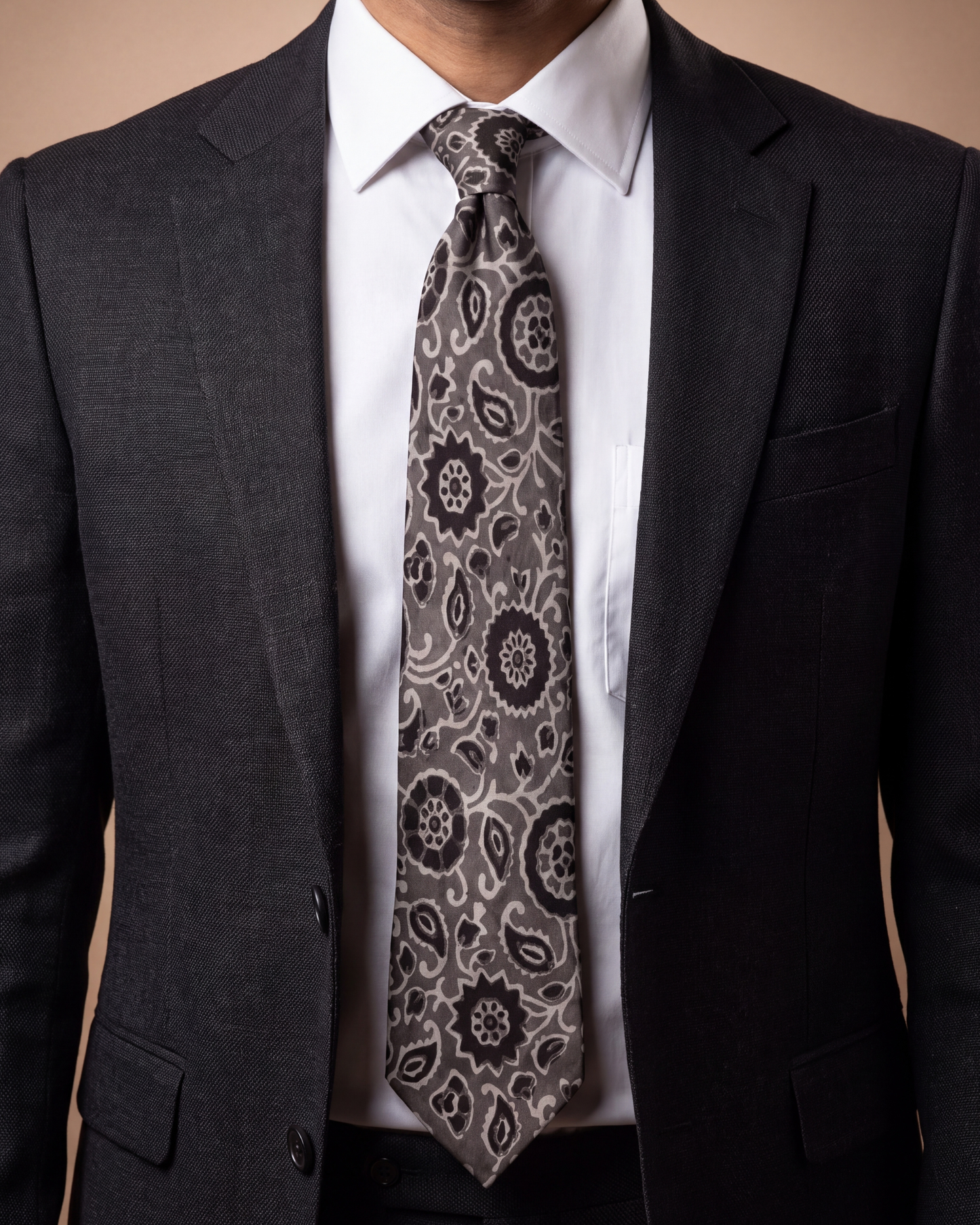 Silver Ash Natural Dye Silk Necktie handcrafted from premium silk with elegant hand block printed floral motifs in silver grey and black.