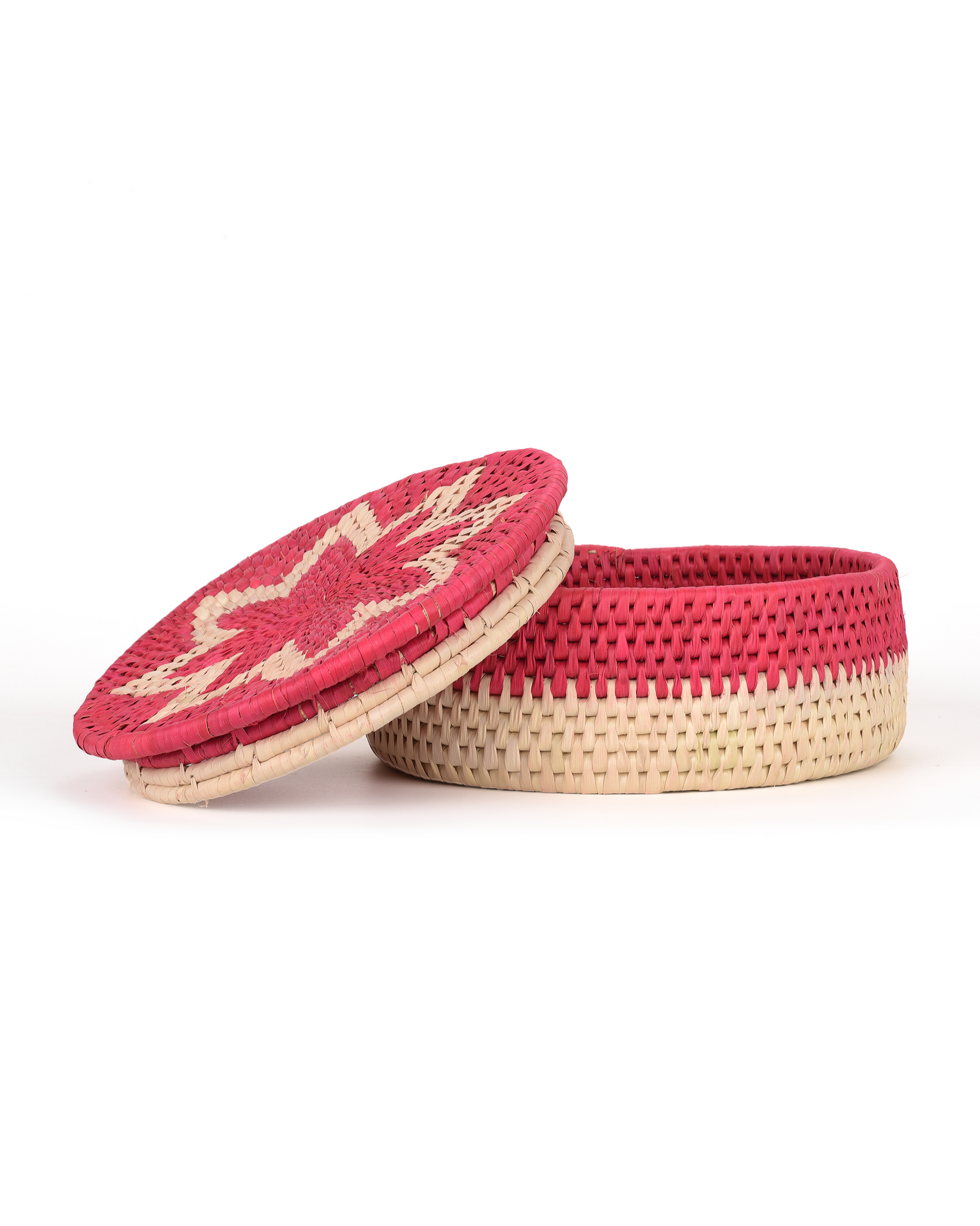 Two red and beige woven baskets on a white background