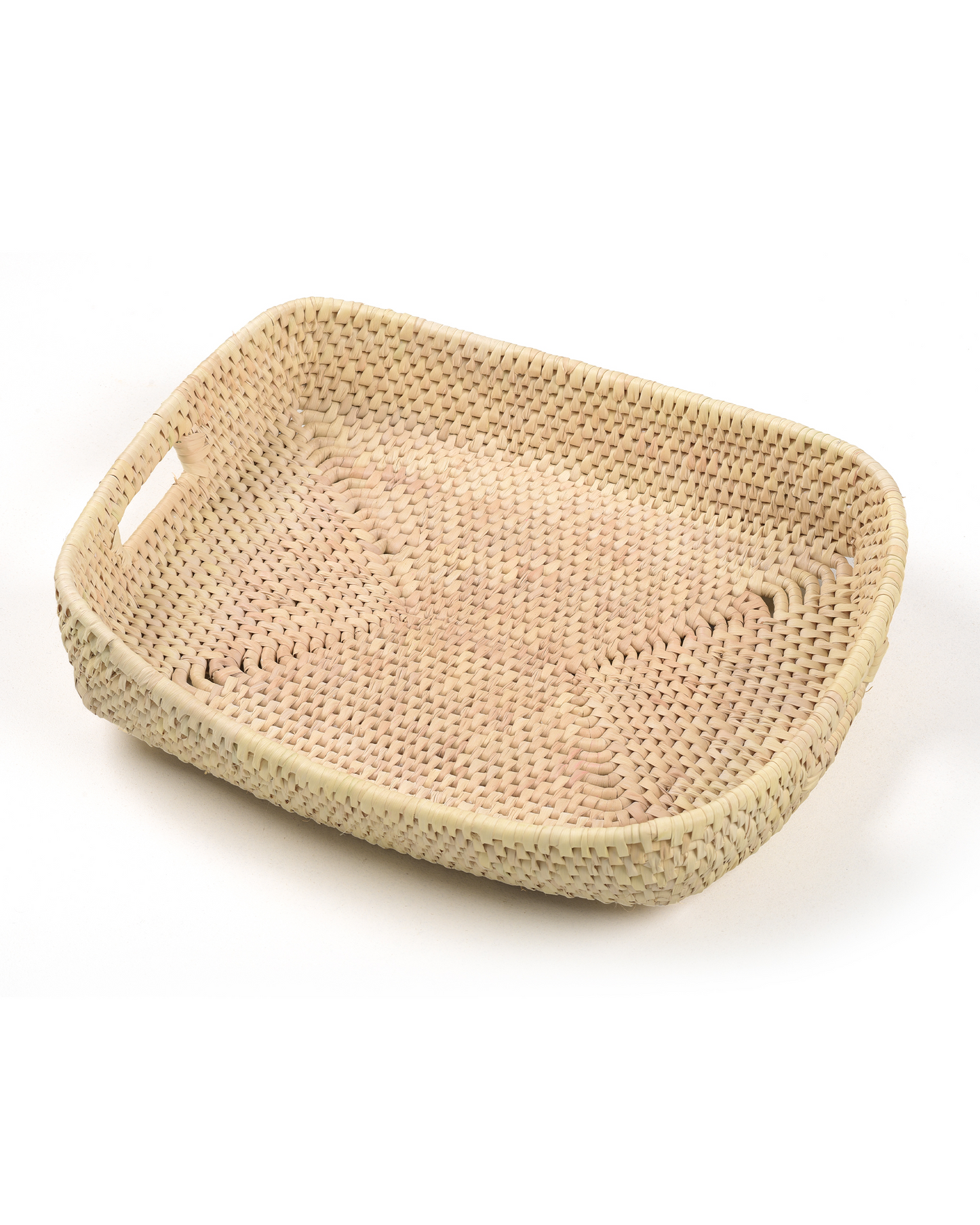 Beige woven tray on a white background
