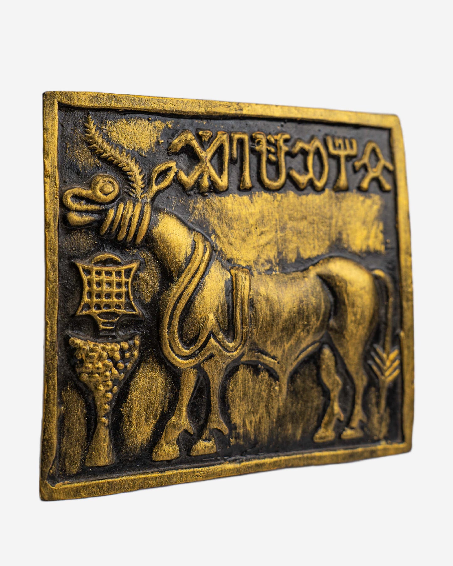 Bronze plaque with a bull and ancient script, Clay Sculpture. Mohen-Jo-Daro Ancient Seal Clay