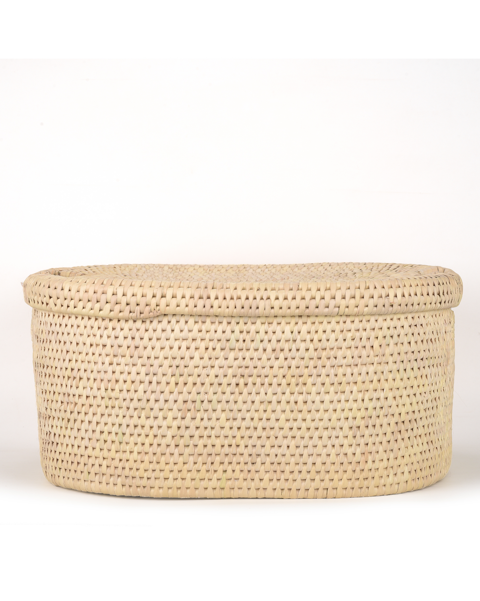 Woven beige storage basket with a lid on a white background