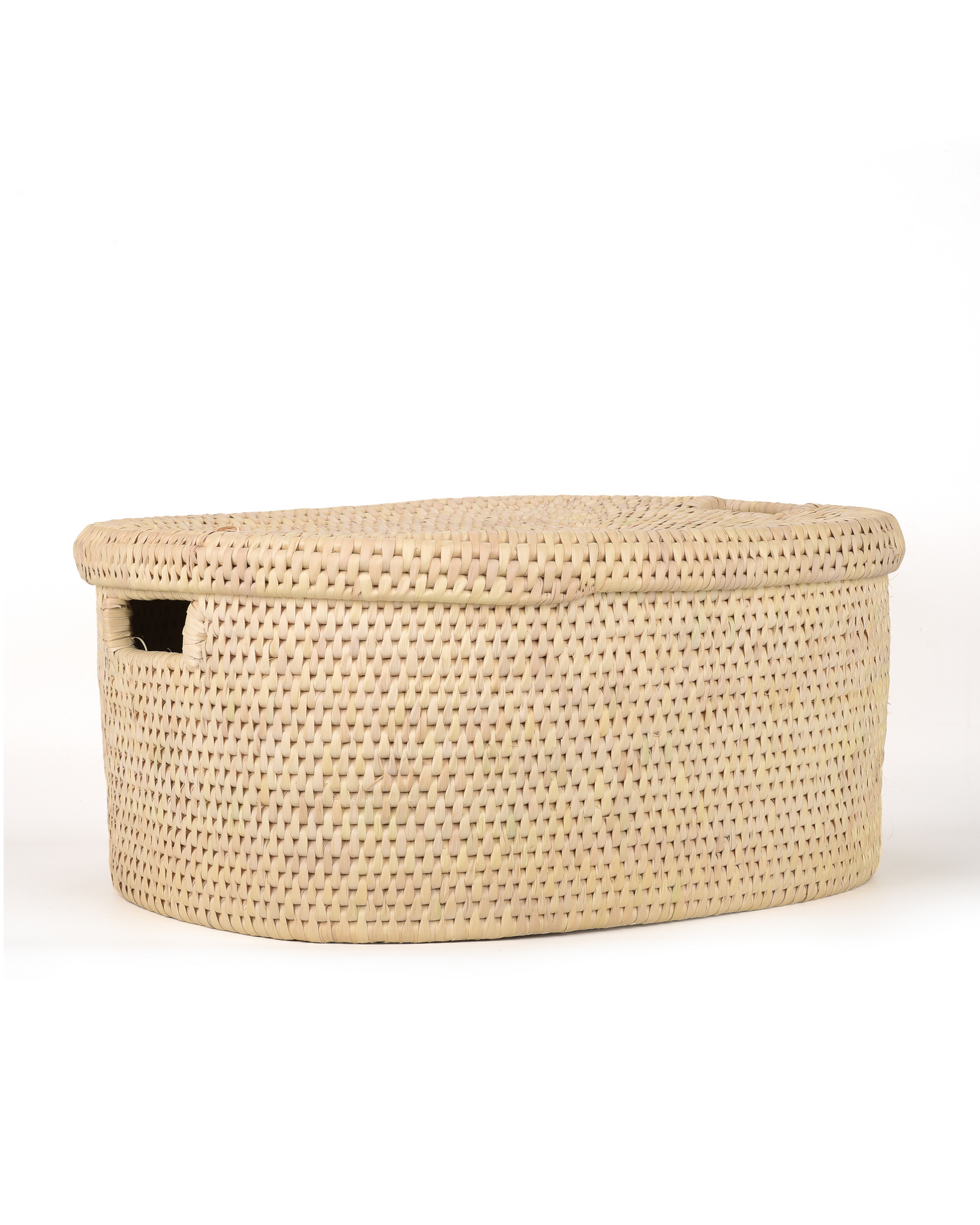 Woven storage basket with a lid on a white background