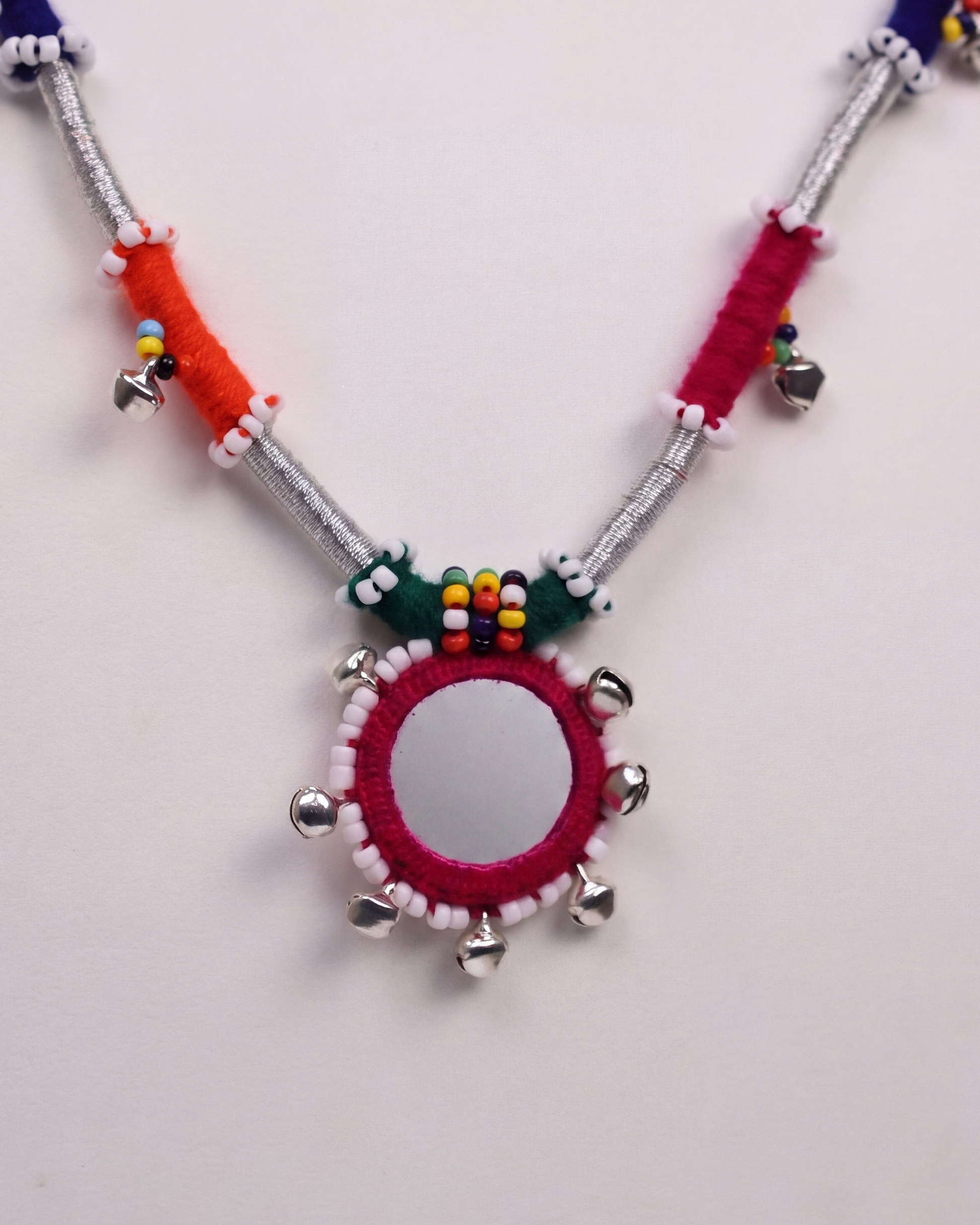 Handcrafted Balochi Mirror Bell Necklace with Colorful Threadwork and Silver Bells